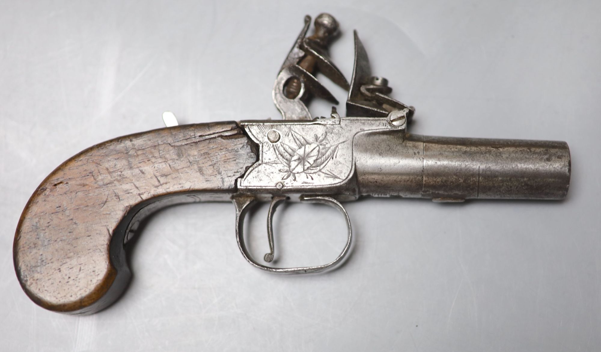 Two 19th century Dunderdale, Mabson & Labron steel flintlock pocket pistols, turn off barrels and walnut butts, in a later oak case